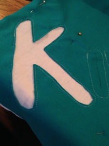 Cut out the top fabric inside the stitching lines.
